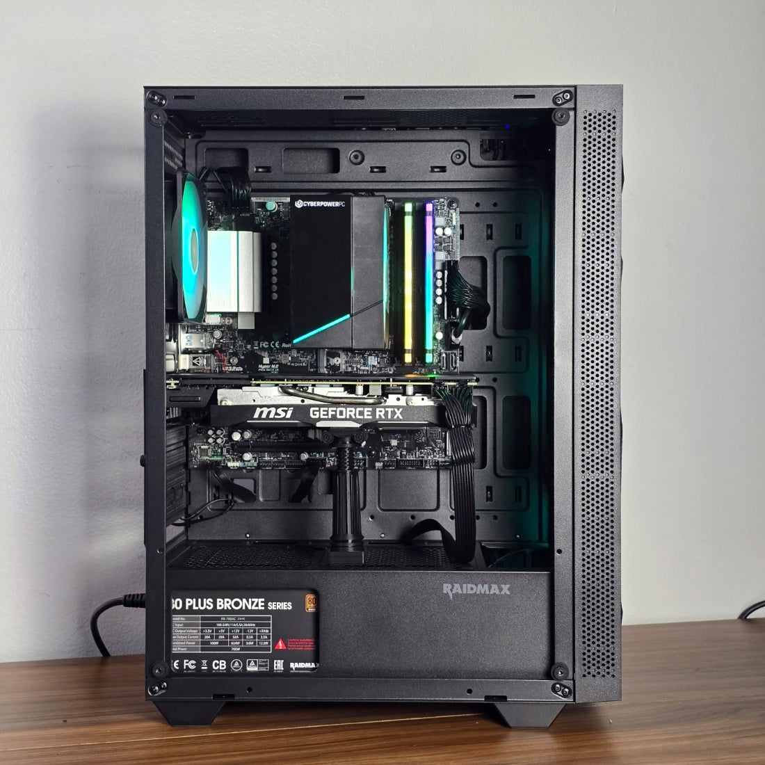 Steel City Computers PC101 gaming PC build, RTX 2070 Super — open side panel showing MSI RTX GPU, ASRock B550M-C motherboard, Corsair Vengeance RGB RAM